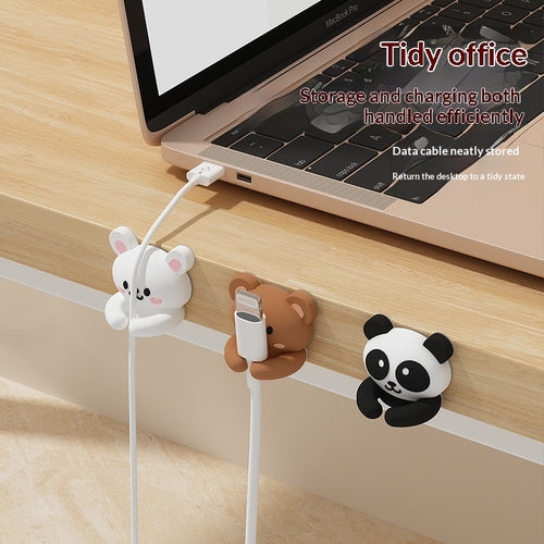 Buddy Cable Holder in bear and rabbit designs holding charging cables